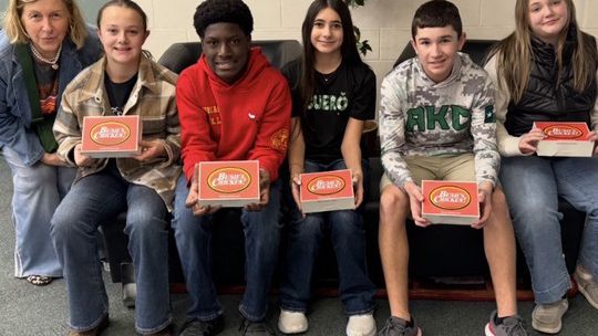 Art students share gift of giving with nursing home residents