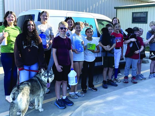 4-H Club helps out at pet shelter