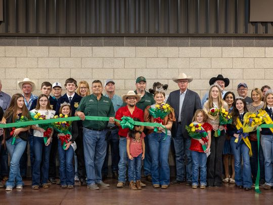 Cuero Livestock Show President Greg Gossett cuts the ribbon to officially open the 2025 event running through March 7 at the Ag Friar Center. (Photo by Toby Fournet)
