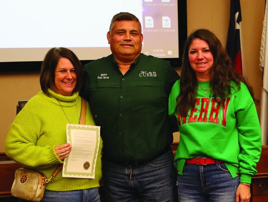 Mayor Emil Garza, center, along with the City Council proclaimed the City of Cuero a Tourism Friendly Community at a special meeting on December 19. Pictured L-R: Chamber Of Commerce Executive Director Angie Cuellar, Garza, and Administrative Assistant Sara Blain. (Contributed Photo)