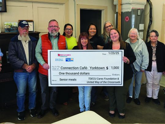 The United Way of the Crossroads, along with matching funds from TDECU, awards a rural grant of $1,000 to Yorktown’s Connection Café. Pictured are senior participants along with Meals on Wheels South Texas President &amp; CEO Dan Capone and staff Lenora Tollefson and Judy Guerrero. They ar...