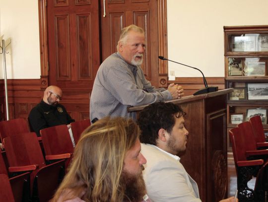 Sheriff Carl Bowen addresses the Commissioners Court regarding the interlocal agreement with Yorktown. STAFF PHOTO