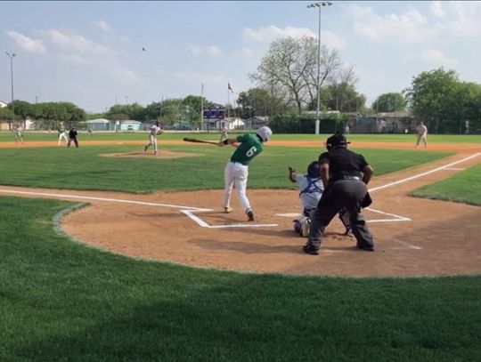 Eli Garrett hits a home run at his first at bat versus SA Memorial. The Gobblers won the district game 16-0. Photo by Laura Patek