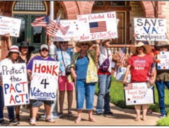 The DeWitt Lavaca County Democratic Women gather at the courthouse on June 6 to rally in support of veteran jobs, healthcare and essential VA services on the anniversary of D-Day. Participants, coming from Cuero as well as Victoria, Shiner, and Hallettsville, marched to the corner of Broad...