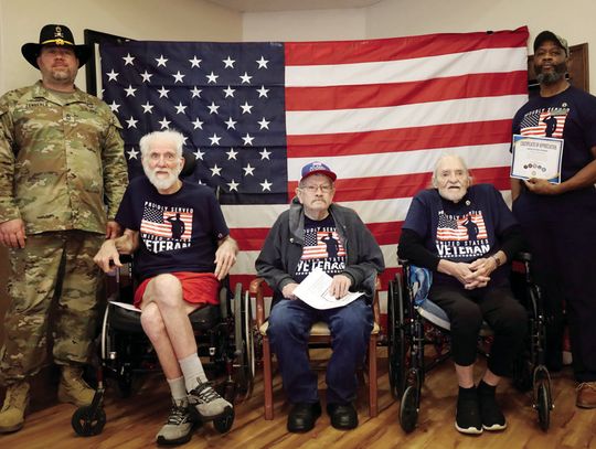 In the center are three of the 13 veterans who were honored with a special pinning ceremony on November 19. L-R: Jeff Zengerle (TNG), Thomas Slater (USMC), Donald Stokes (USA), Gordon Kaiser (USA), and Kenneth McCarthy (USN). CONTRIBUTED PHOTO