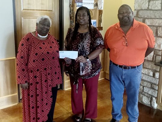 Cuero National Bank gave a donation of $500 for the 10th Annual Ethosha Lynn Back to School Bash, which will occur on Aug. 3 at the Cuero City Park Pavilion. Pictured L-R: Viola Holman, Helen McAfee, and Paul Harper. (Contributed Photo)
