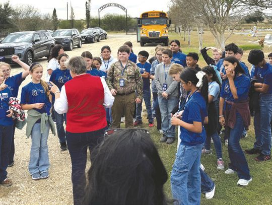 Flags placed on veteran graves at Westhoff Cemetery