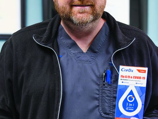 Cuero Regional Hospital Chief of Obstetrics and Staff Physician Dr. Paul Willers holds a CorDX Ty-Fast home test kit, but he also recommends going to the hospital lab for testing. He said after testing, doctors can prescribe the appropriate treatment. PHOTO BY ELE CHEW