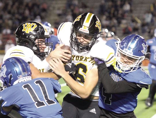Yorktown quarterback Brody Metting pushes for more yards in the playoff game against Ben Bolt on Friday, which ended in a hard fought 38-19 loss. PHOTOS BY DEIRDRE ALEXANDER