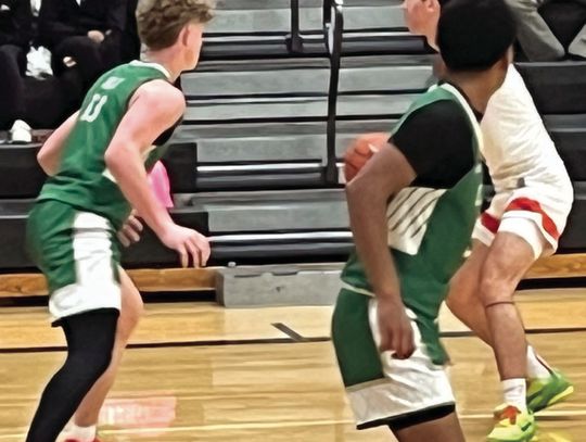 Walker Dietze and Tony Perez in the zone on defense during the Gonzales matchup. (Contributed Photo)