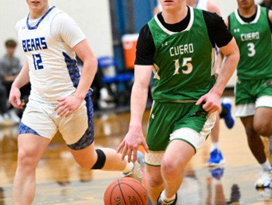 Junior Conner Molina brings the ball down to set up the offense during the LaVernia district match up Photo by Courtney Kubesch