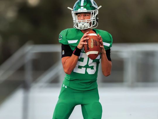 In the absence of injured QB Jaxxon Marie, sophomore Jayce Guajardo stepped up to varsity quarterback in Friday’s game against Harlingen. The Gobblers won the nail biter 24-14. (Photos by Mike Cantu)