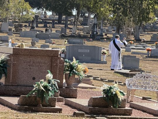 Graves blessed for All Souls Day
