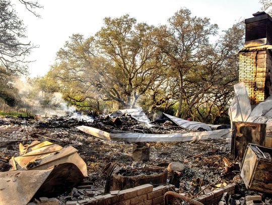 Cherished family photos, wedding dresses, and invaluable heirloom jewelry are now lost beneath the smoldering ruins of the Hill residence, which was destroyed by _re on March 23rd. (Photo by Ele Chew)