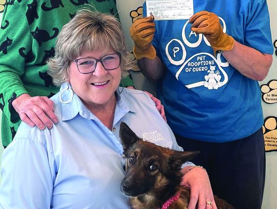 Denise Goebel, event coordinator of Hometown Harvest Dinner, recently made a donation to Pet Adoptions of Cuero board members and volunteers Linda Anzaldua and Nelda Huber. The annual outdoor dinner on Cuero’s Main Street raises money for local nonpro_ts. (Contributed Photo)
