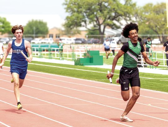 Chris Mathis pulls ahead of the LaVernia runner on the last leg of the 4 x 200 Relay at the District track Meet on April 2. The Gobblers _nished 1st in the relay. (Contributed
