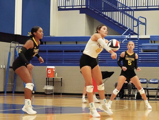 Libero Nina Villarreal digs up a pass against a tough district opponent. PHOTOS BY VALERIE STUART