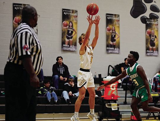 Wildcat junior Brody Metting makes a 3-pointer to start the game against Woodsboro.