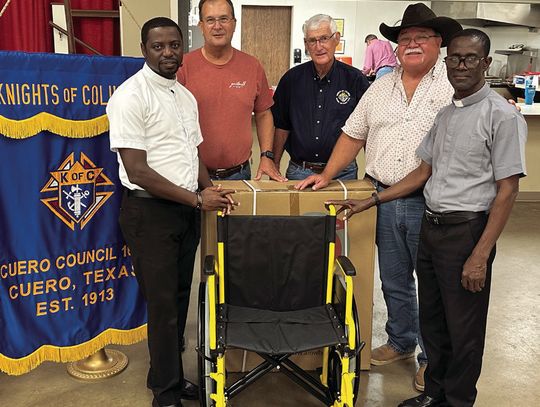 (L-R): Father Richard Bediako, Bryan Haun (KC wheelchair committee chair), Bill Morrow (KC District Deputy), Ken Klimitchek (Cuero KC Grand Knight), and Father Paul Otchere. CONTRIIBUTED PHOTO