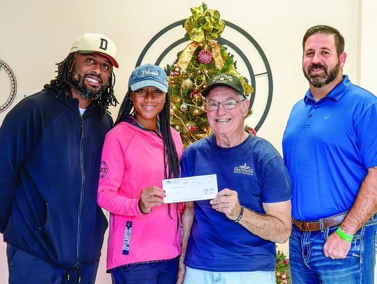 Hochheim Prairie Insurance Branch 2 donates $200 to Cuero’s Little Dribblers' program. Pictured L-R:Terrence Coulter, Cuero Little Dribblers president; Ashakoy Coulter, secretary; Hochheim Prairie President Ronnie Dietz and board member Will Carbonara (Photo by Ele Chew)