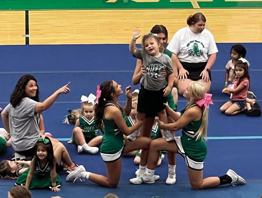 Look for mini cheerleaders at Friday's game