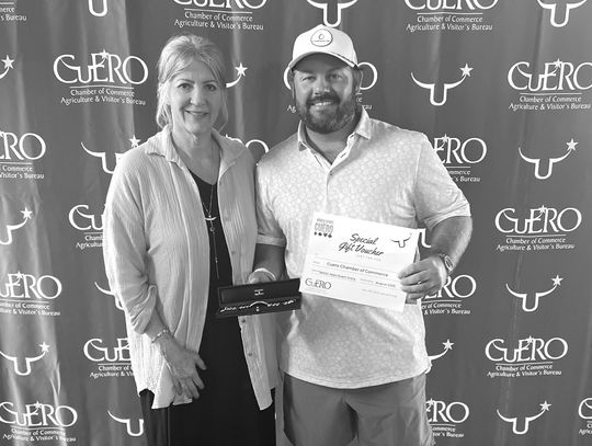 Chamber President Cecilia Hedrick with 1st Place winner Patrick Bell. (Contributed photo)