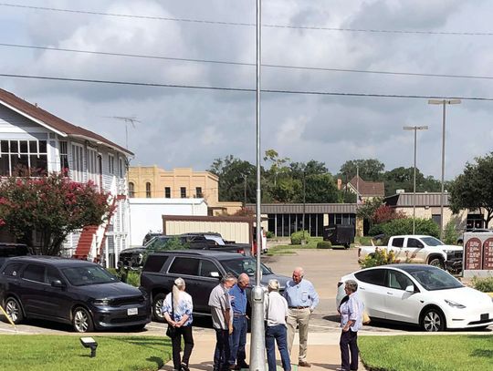 Members of the DWC Historical Commission pause with Bill Blackwell and Fain McDougal at the site in front of the courthouse where Colonel William Travis’ Letter from the Alamo will be installed