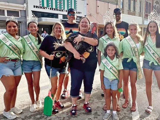 After the Rally for Ruby on Saturday, the Miss Cuero Court welcomed the newest Ruby Begonia as Cuero’s champion for this year’s Turkey Trot. (L-R) Jaslyn Pena, Bailey Woods, Sherry Oakes, Leslie Voelkel (holding “Ruby”), Miss Cuero Emily Woods, Keely Bryan and Maria Gonzales. In front is J...