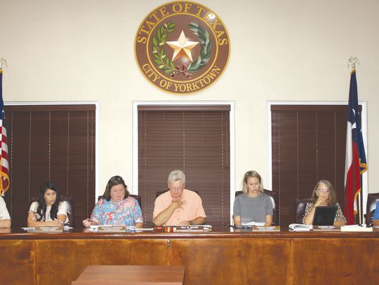 The Yorktown City Council meets in City Hall on June 24: (L-R) Mike Rippamonti, Crystal Hurta, Michele Warwas, Mayor Bill Baker, Megan Thomas, Connie Hall and Dickey Rodriguez. A number of subjects were discussed, including a $5,000 a month dip in sales taxes. CONTRIBUTED PHOTO