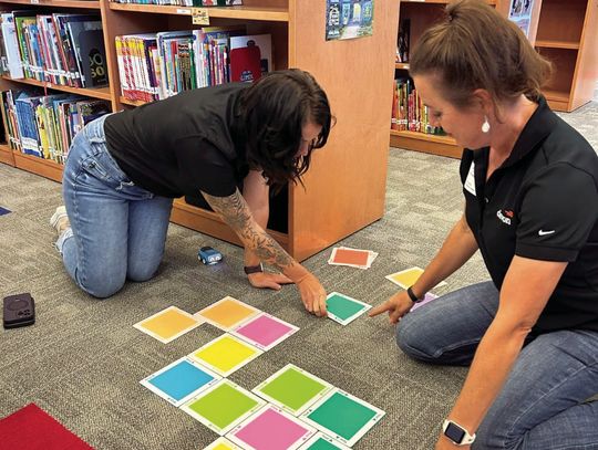 Volunteers set up the new STEM tools from Devon Energy. Hunt Elementary School recently held a STEM Refresh Night for families as part of their Magical Monday series. (Contributed Photos)