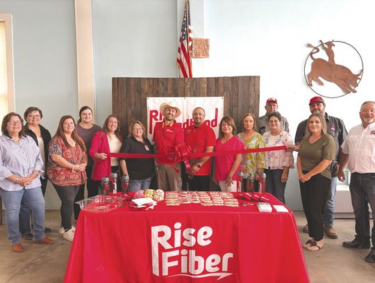 Rise Broadband celebrated its official grand opening on May 6, hosted by the Yorktown Chamber of Commerce. Manager Steven Lujan, center, cut the ribbon along with Ryan Doyle and Connie Herman, to the left. Also from Rise Broadband on the far right was Kyle Peterson. STAFF PHOTO