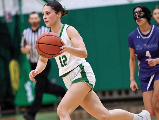 Senior Jaydie Cooper brings the ball down during the LaVernia game. (Photos by Courtney Kubesch)