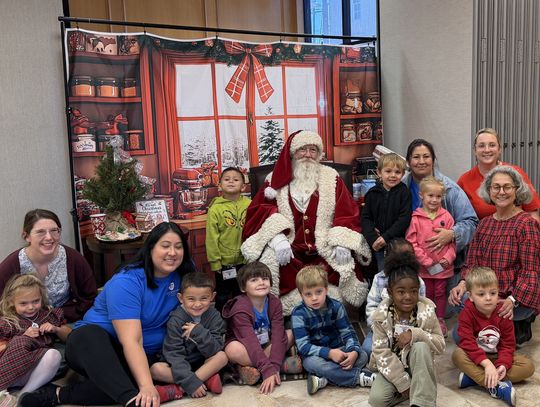 Santa Claus visits Trust Texas Bank