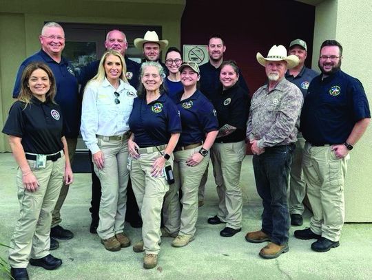 DeWitt County Sheriff Carl Bowen, second from the right, worked with an Incident Support Taskforce to help residents in Bakersville, North Carolina recover from Hurricane Helene. (Contributed Photo)