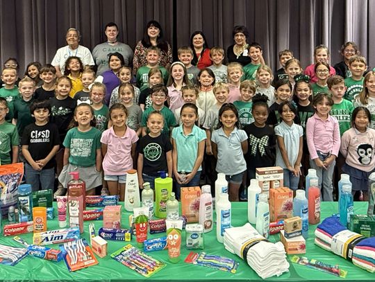 Students collect for CAMAL House