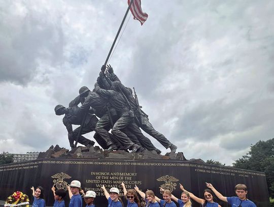 Yorktown students visit the United States Marine Corps Memorial and point at Yorktown native Harlon Block, who is crouching and closest to the ground. CONTRIBUTED PHOTO