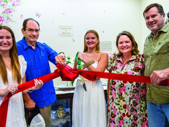 The Cuero Heritage Museum held a ribbon-cutting ceremony with the Giles Family to unveil The Patti Giles Collection of English Tea Pots and Biscuit Jars in the new Genealogy Room on May 21. PHOTO BY ELE CHEW