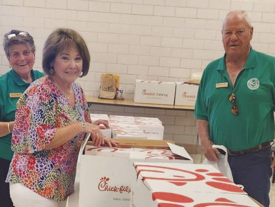CISDEF board members Sandy White, Bonnie Wheeler, and Darwin Koenning lend a hand in preparing lunches for grateful Cuero ISD staff. (Contributed photos)