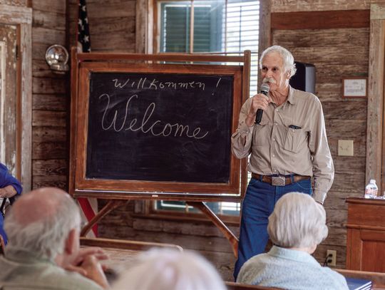 Dr. James Kearney discusses the history of German immigrants in Texas at Kaffeeklatsche on March 23. The gathering celebrated the release of the book he translated from German for the DeWitt County Historical Commission. (Photo by Ele Chew)