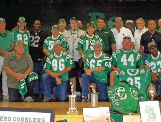 The 1974 Gobbler back-to-back state championship team members and coaches gather at their reception on September 20 in the Cuero High School cafeteria. (Contributed Photo)