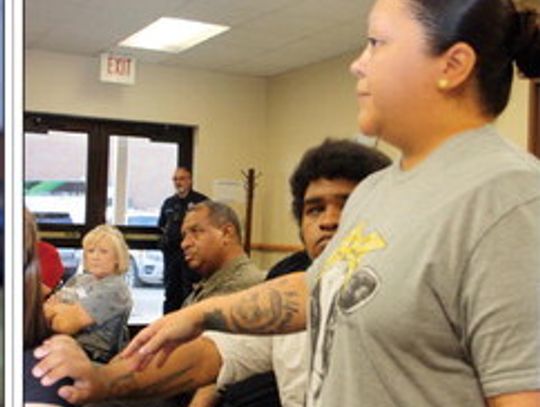 Stephanie Villarreal addresses the Cuero ISD school board on the issue of bullying. (Staff photo)