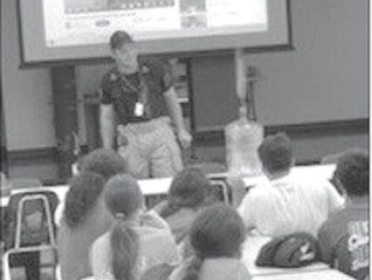 Westhoff VFD Chief Andrew Weikel talks with students about fire safety. (Contributed Photo)