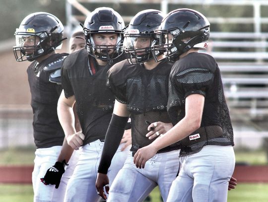 The line consisting of Colton Rogers, Xavier Naranjo, Trent Foerster, and Manuel Macias moves toward the line of scrimmage, (missing is sophomore Gunnar Hughes). PHOTOS BY DEIRDRE ALEXANDER
