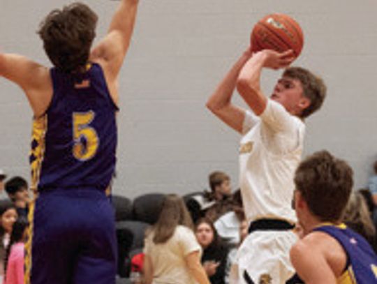 Sophomore Brayden Knostman pulls up for a jump shot.