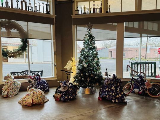 Presents under Cowboy Claus Tree are waiting for children to pick them up on December 19 from 5:30 to 6:30 p.m. CONTRIBUTED PHOTO