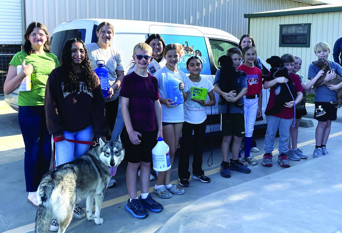 4-H Club helps out at pet shelter