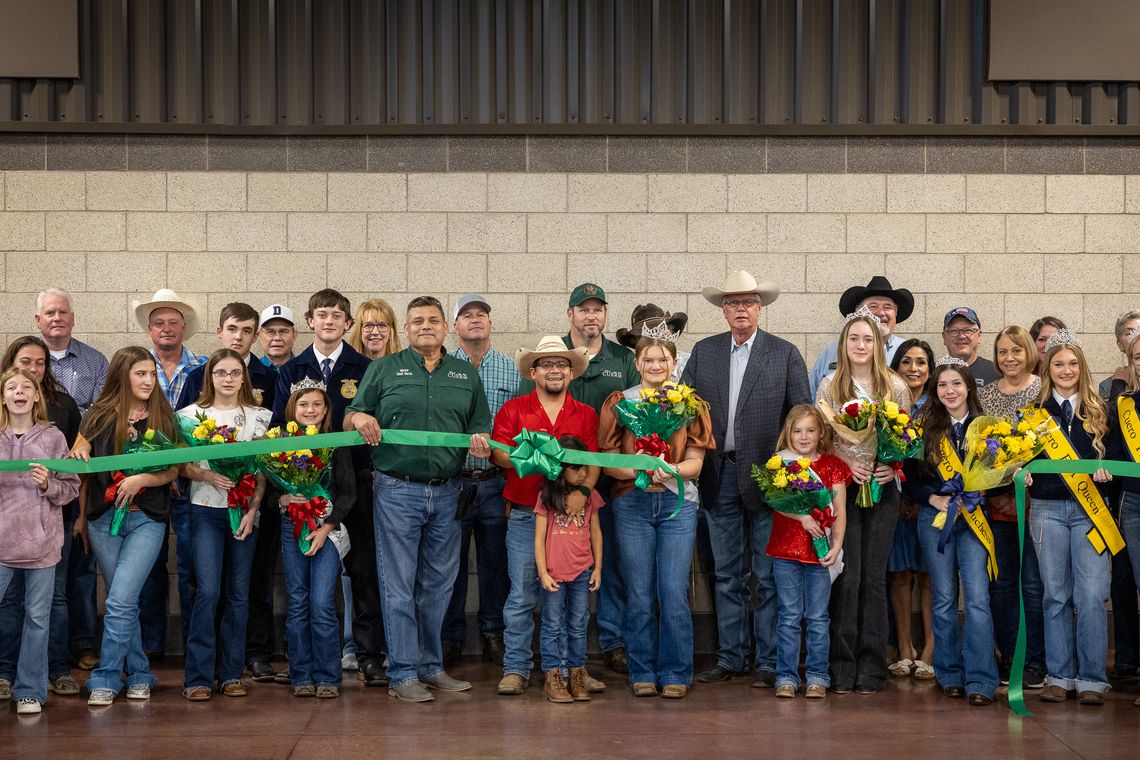 Cuero Livestock Show President Greg Gossett cuts the ribbon to officially open the 2025 event running through March 7 at the Ag Friar Center. (Photo by Toby Fournet)
