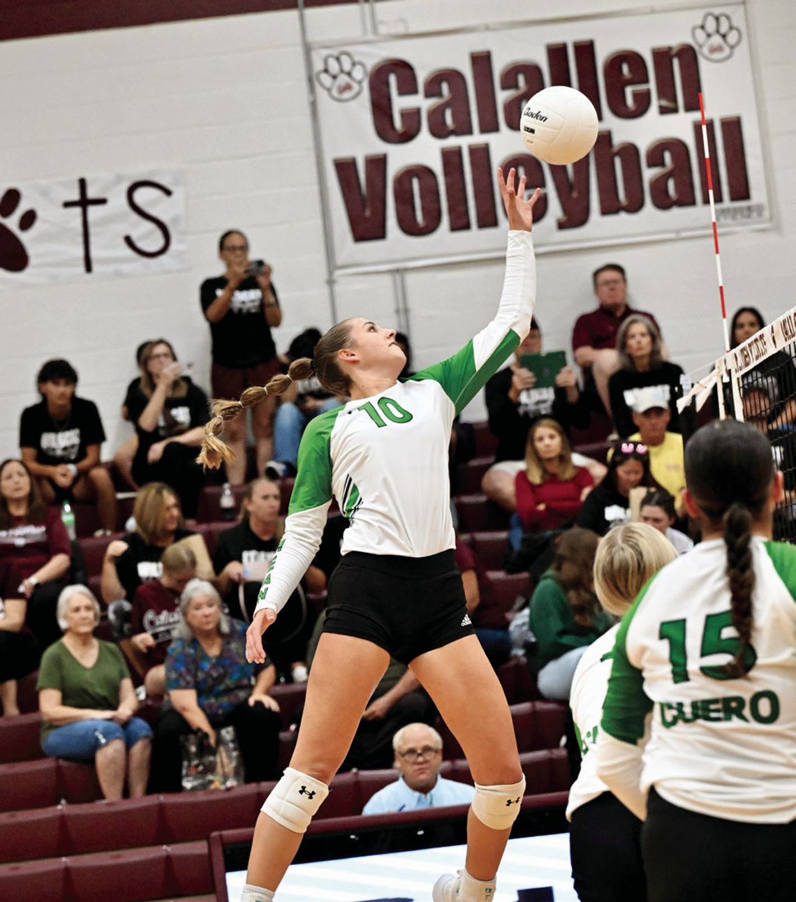Senior Arissa Carbonara pushes the ball over the net to win the point at Calallen on September 3. The Lady Gobblers beat Calallen in a five-set thriller on Sep. 3.
