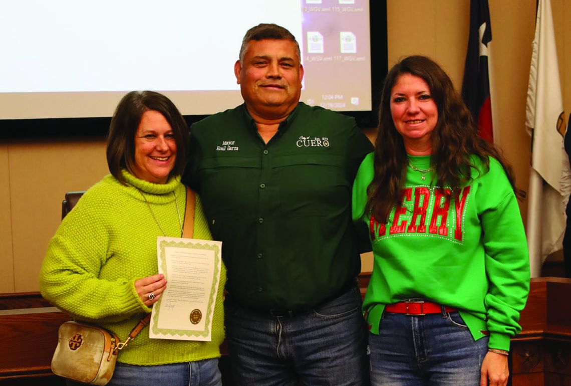 Mayor Emil Garza, center, along with the City Council proclaimed the City of Cuero a Tourism Friendly Community at a special meeting on December 19. Pictured L-R: Chamber Of Commerce Executive Director Angie Cuellar, Garza, and Administrative Assistant Sara Blain. (Contributed Photo)