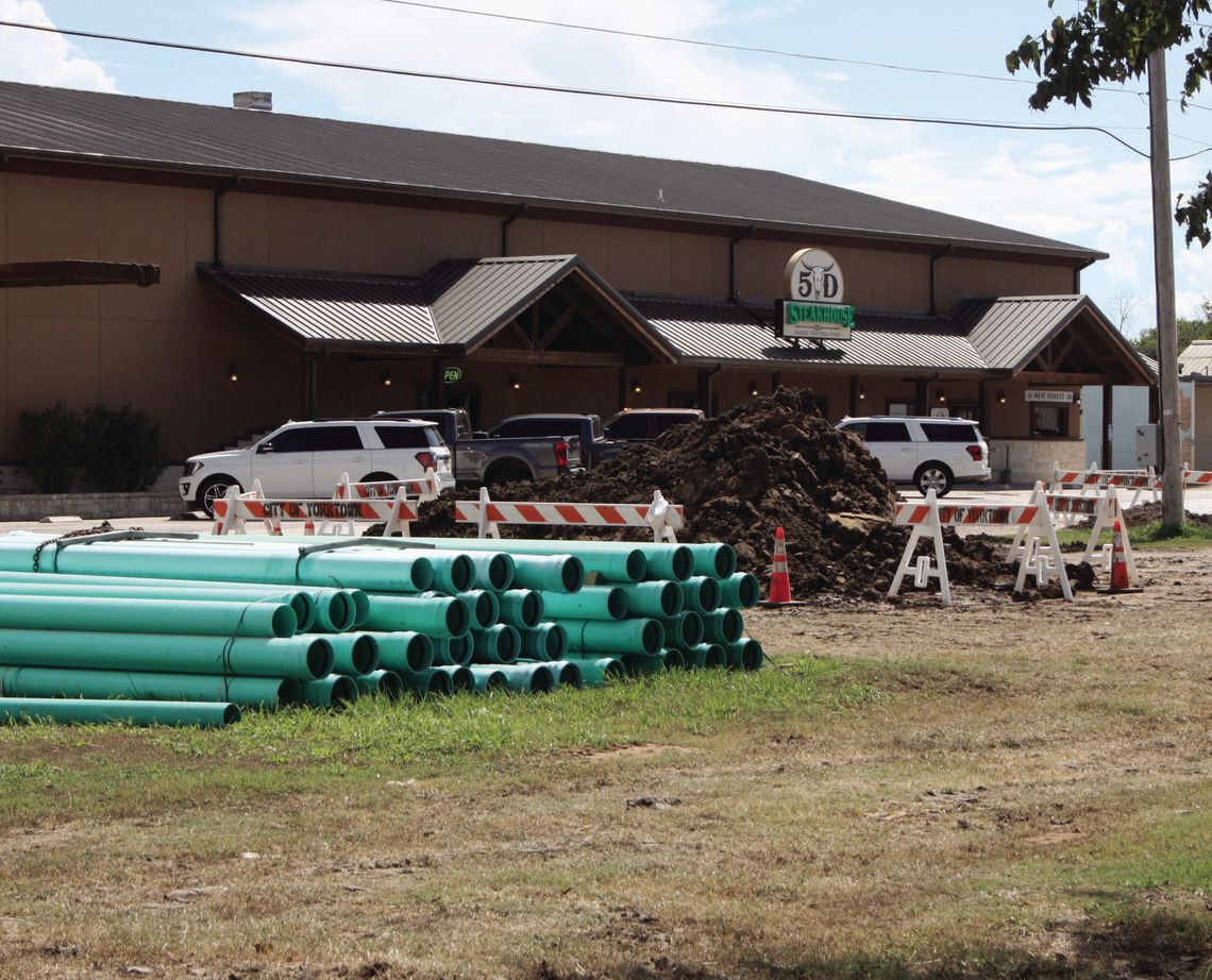 The sewer line across from 5D Steakhouse has collapsed and is being replaced with PVC pipe. STAFF PHOTO